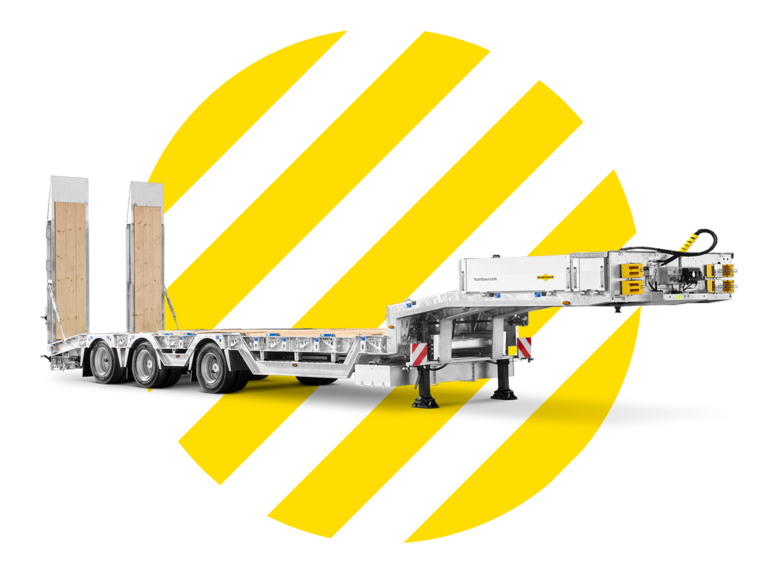 HTS low-loader semi-trailer on striped yellow background | © Humbaur GmbH